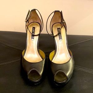 Nine West-Black leather Heels with half inch platform.